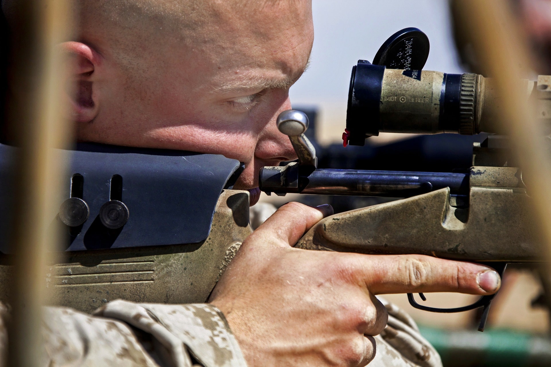 soldier aiming with a sniper rifle