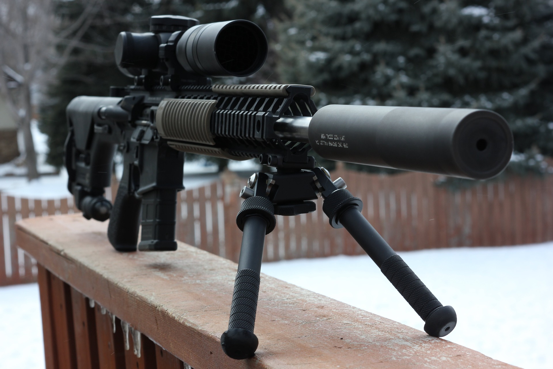 Sniper rifle on railing