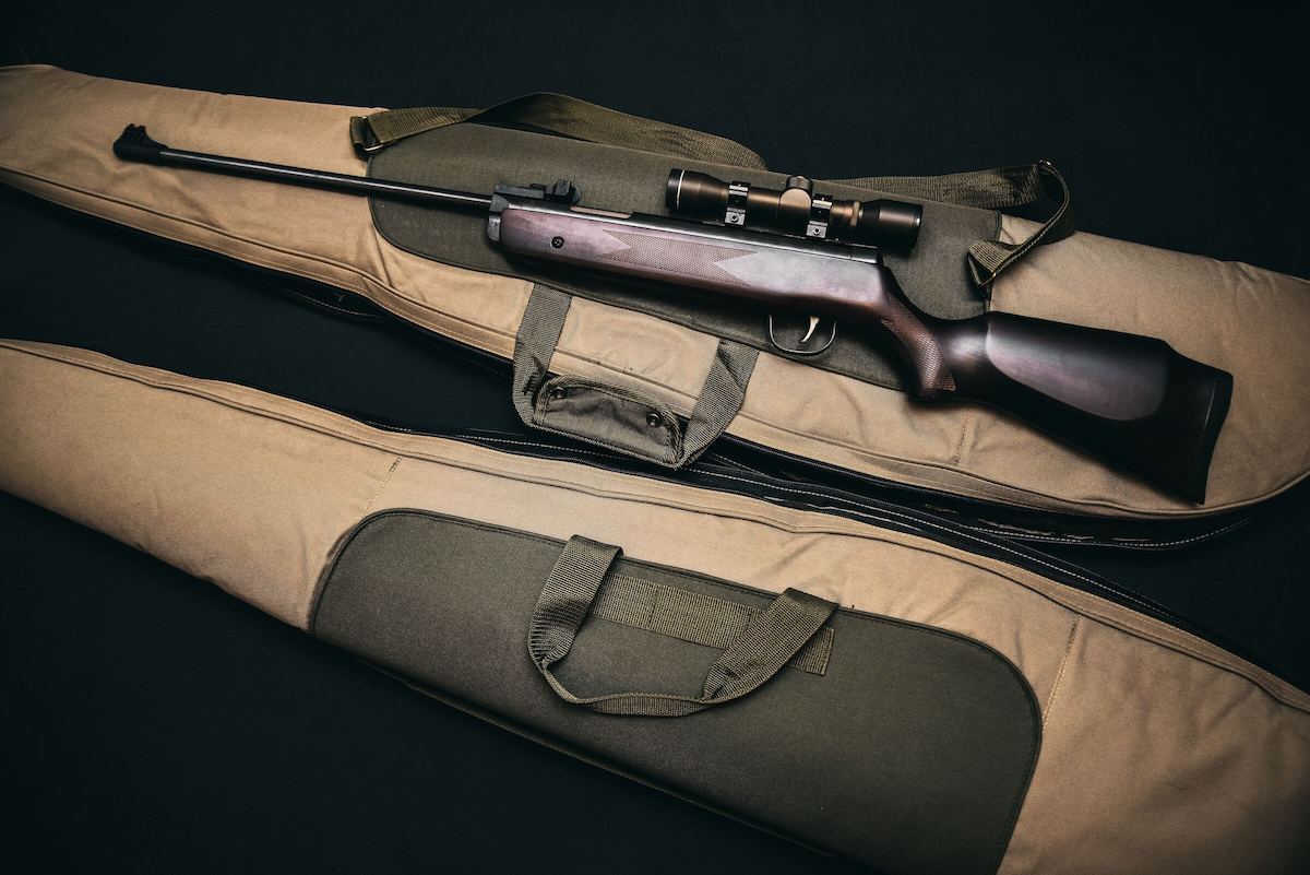 sniper rifle in a beige bag